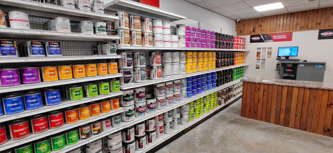 Happy Hardware has a selection of paints and a computerized paint mixer from California Paints.