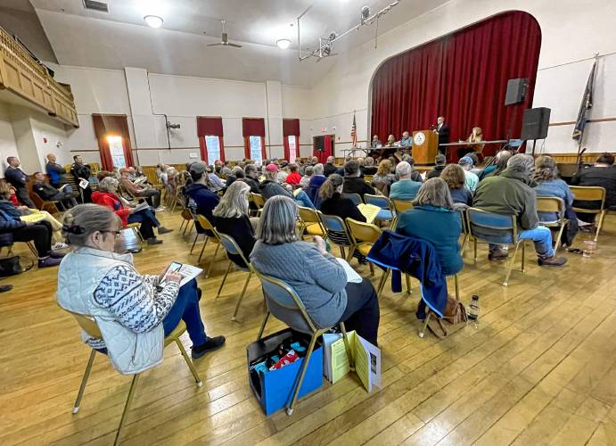 Residents attend Antrim Town Meeting Thursday night.