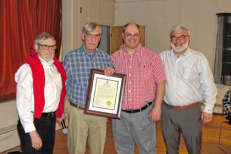 The town thanks 250th Jubilee Committee members, from left, Marc Tieger, Select Board Chair Frank Sterling, Peter Chamberlain and Town Manager Jon Frederick.