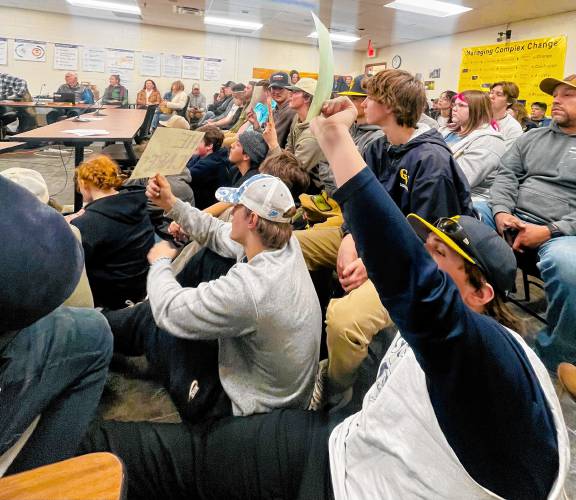  ConVal students pack the SAU conference room Tuesday night to show their support for AD Kevin Proctor. 