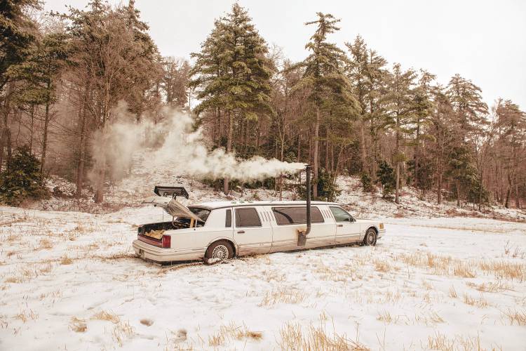 A 1994 Lincoln Town Car limousine  has been converted into a sauna.