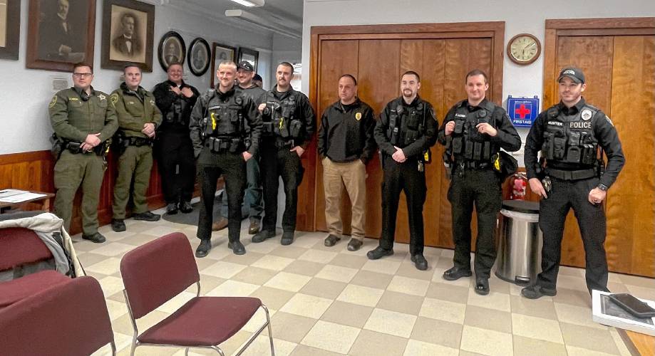 Members of the Antrim Police Department and other supporters fill Antrim’s Little Town Hall Monday night to congratulate John Blake on being pinned chief of police. 