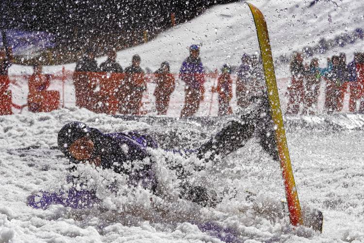 A skier embraces gravity’s unexpected lessons at the Pond Skim.