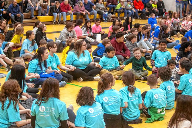Jaffrey Grade School Destination Imagination teams, with their coaches Madelyn Grierson and Alexis Compton, at the closing ceremony of the regional competition.