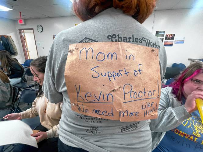 A ConVal mother shows her support for Athletic Director Kevin Proctor. 