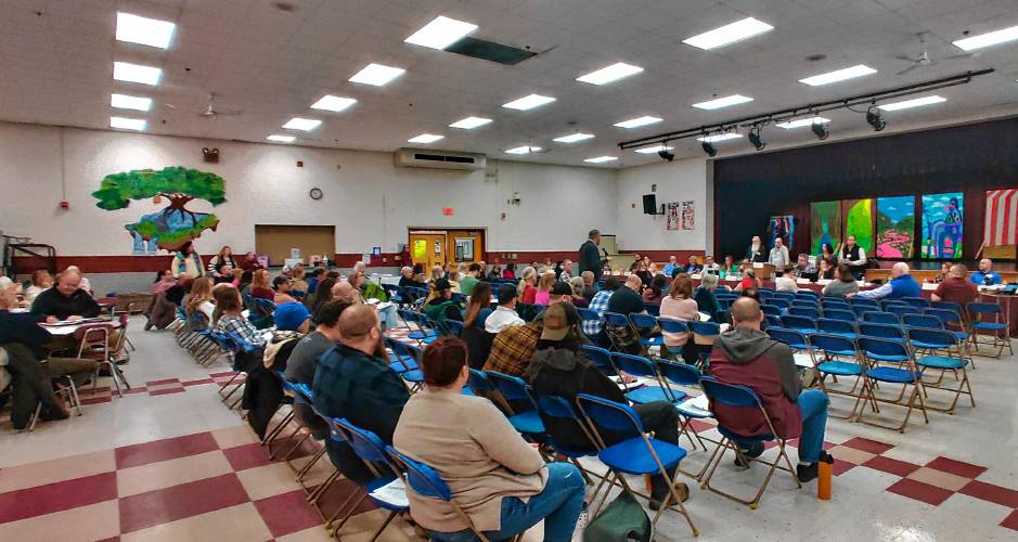 Wilton and Lyndeborough residents gather at the Wilton-Lyndeborough Cooperative Middle High School for the 2024 district meeting.