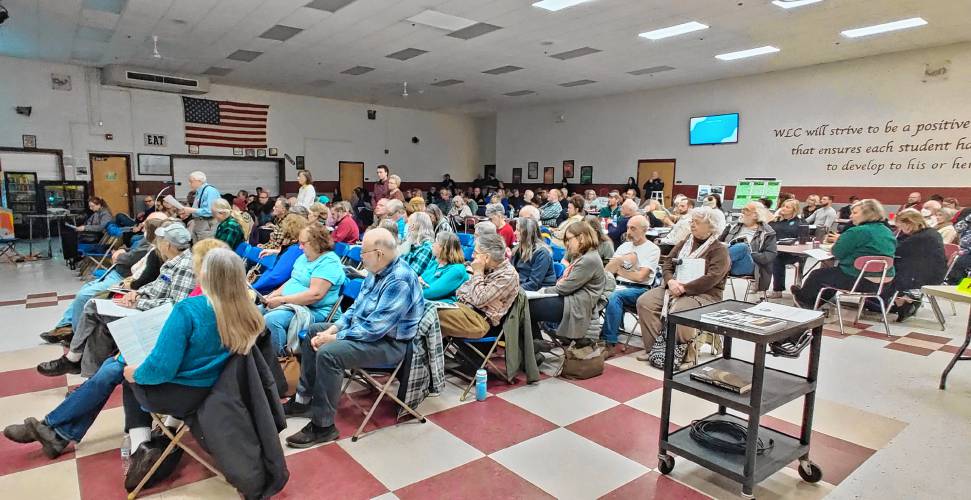 Wilton residents gather in WLC Cooperative Middle/High School for the 2024 Town Meeting.