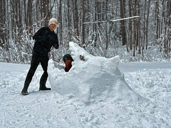 Beckett Ketola and Blake Traffie get creative in the snow.
