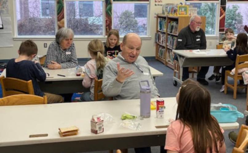 Antrim Elementary School students chat and share laughs during the Lunches with Lions program in collaboration with the Antrim/Bennington Lions Club.