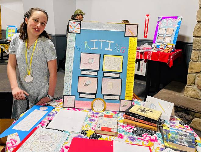 Fiona Heffron, a seventh-grader at Mountain Shadows School, studied writing for her Olympic Studies project. 