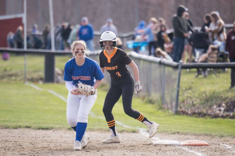 Conant's Maddie Bergeron leads off first as Mascenic's Payton Lafreniere holds her on.