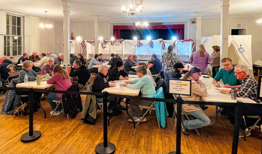 Volunteer ballot counters in Greenfield worked until late hours Tuesday night.