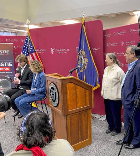 Franklin Pierce University student Coleby Vasoll introduces former New Jersey Gov. Chris Christie as fellow student host Jenna Parent, Marlin Fitzwater Center for Communication Director Kristen Nevious and Christie look on.