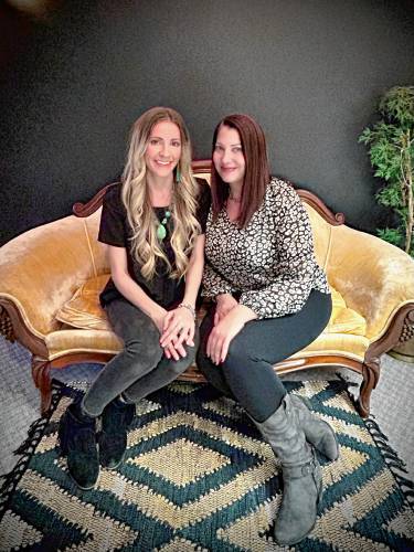 Danielle Jennings (left) and Eva Torontali seated in the Salitter Studio. 