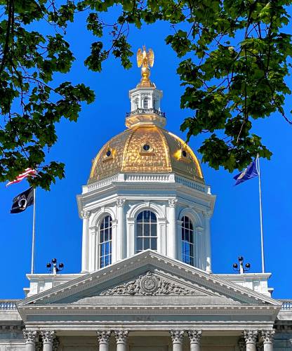 The State House dome in downtown Concord.