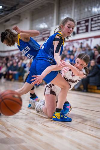 WLC freshman Lexi Bausha passes out of pressure during Tuesday’s game. 