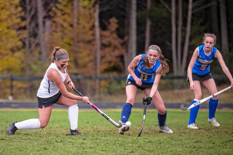 Conant senior Megan Newton gets off a shot against Kearsarge during the NHIAA Division III field hockey tournament first-round game in Jaffrey on Oct. 18.