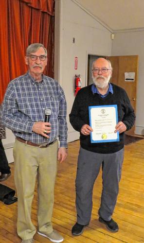 Select Board Chair Frank Sterling with Rob Stephenson, who was thanked for years on the Meetinghouse Committee.