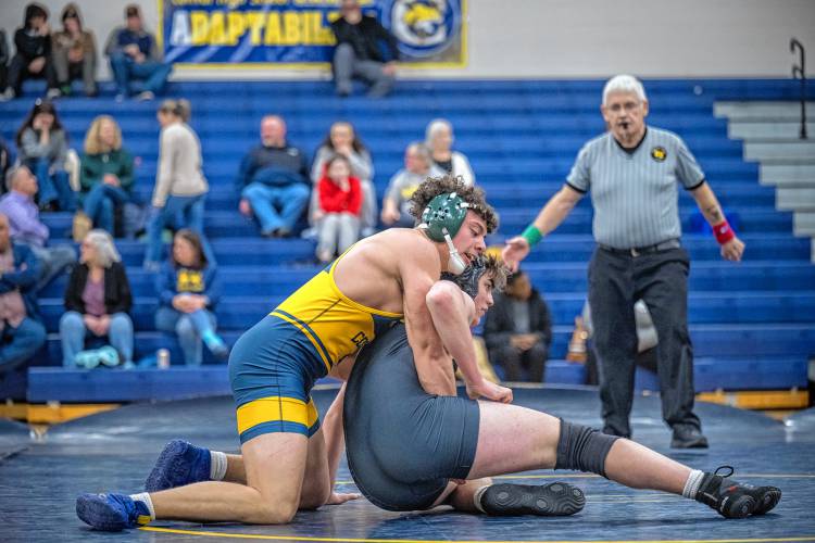 ConVal’s Drake Bay gets some work done against his Souhegan opponent.