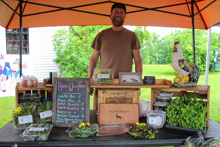 Organizer Nate Choquette of Rustic Wolf Farm sold salad greens and eggs at his stall.