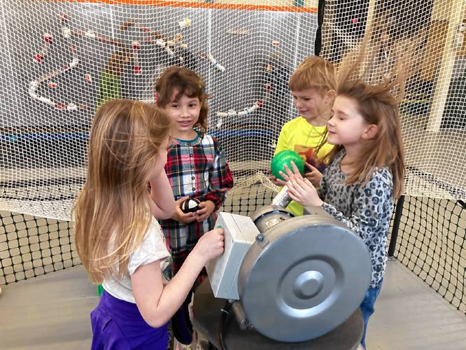 Students explore science-related hands-on activities at the SEE Science Center.