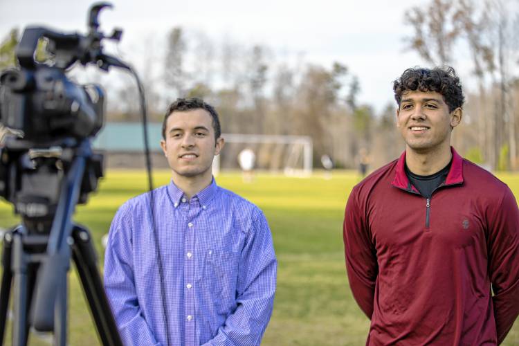 Franklin Pierce students Rich Rosa (left) and Erik Valdovinos prepare to report from the NCAA D-II national soccer championships in Matthews, N.C. The duo was part of a team of students from the university’s Ravens Sports Network, which broadcast the first Spanish language soccer games for the NCAA.