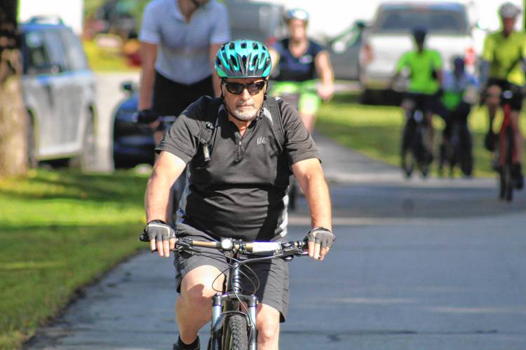 Dave Silva of Pelham, representing sponsor Airmar Technologies of Milford, starts the ride from Center Hall.