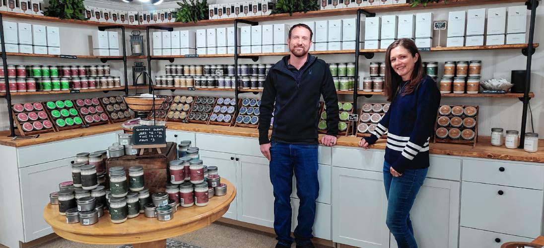 Grey Horse Candle Company owners Brian and Leyna Cannon stand in their new storefront in downtown Peterborough.