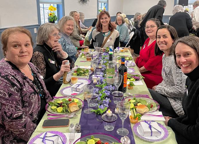 Clockwise, from left, are Donna Ehrler, Madeleine Gordon, Cathy Klimacek, Lindsey Bishop, Melissa Luce, Maureen Troy, Jennifer Vadney at the Women of Francestown Dinner. 
