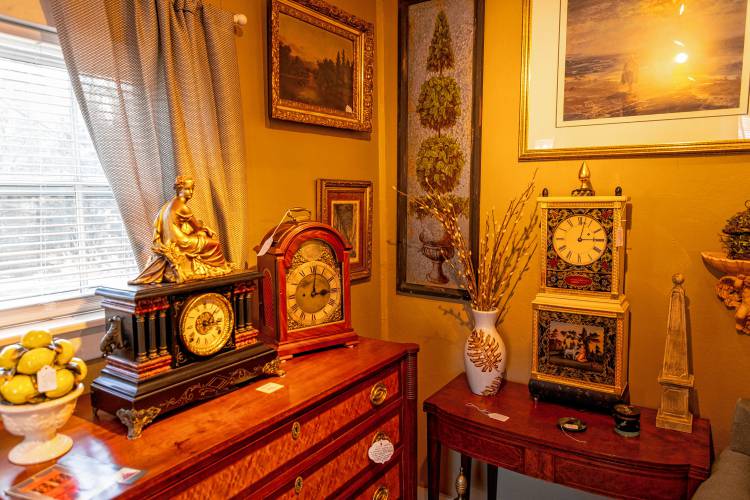 A set of intricate Federal antique clocks on the first floor of Hayfields Antiques. 