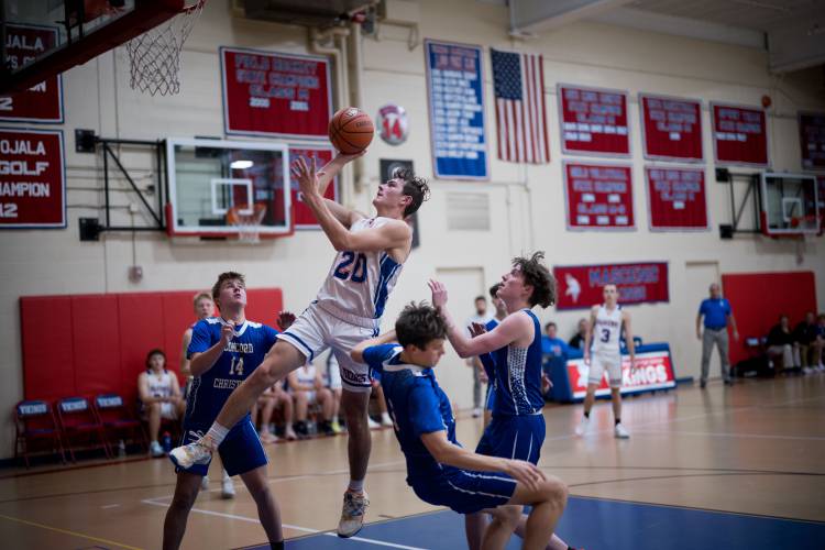 Mascenic's Lucas Leroux gets a layup against Concord Christian.
