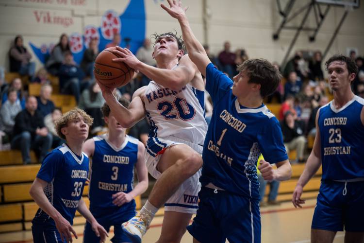 Mascenic's Lucas Leroux gets a layup against Concord Christian. 