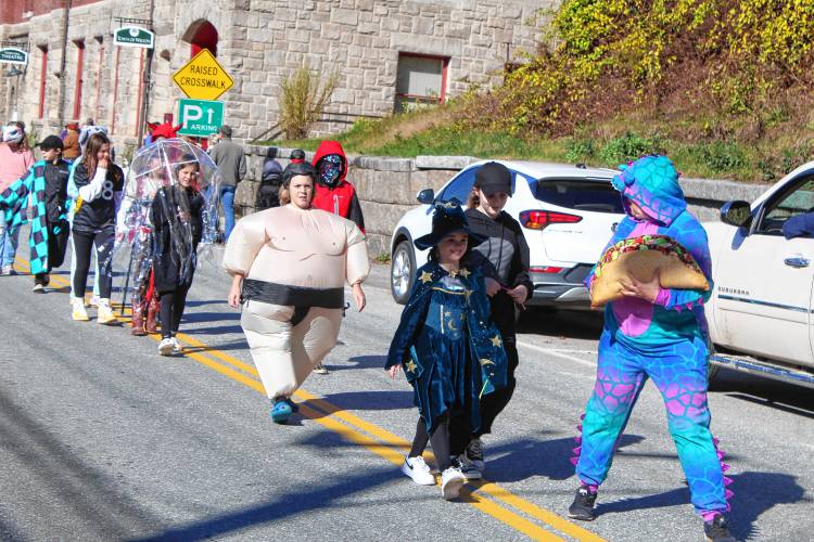 Florence Rideout Elementary School students march down Main Street in Wilton on Tuesday for the annual Halloween costume parade.