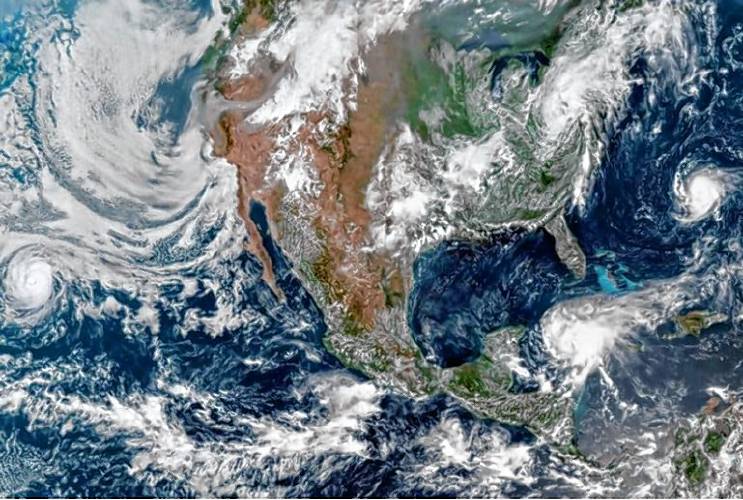 A satellite image of storms churning around North America on Aug. 18, 2021.