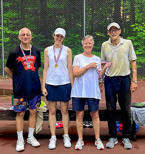 Pickleball tournament winners, from left, Andrew Brescia (second place), Marie St. Clare (first place), Barbara Johnson and Bruce Dennis (tied for third place).