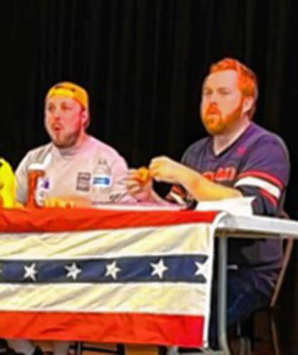 Theo Groh, right, beat out Sam Feinberg by a bun in the hot dog-eating contest.