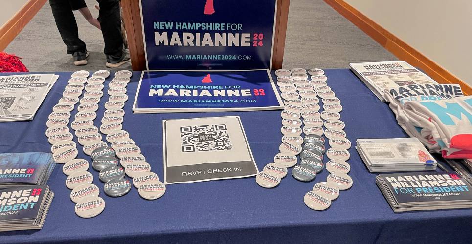 Democratic presidential hopeful Marianne Williamson’s campaign table.