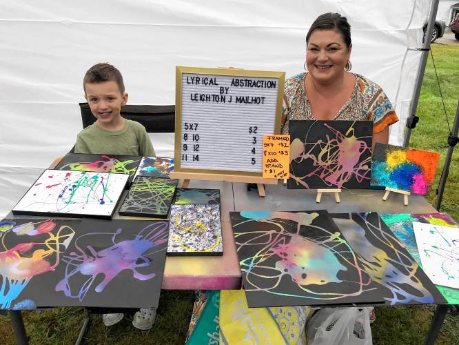 Leighton and his mother Kristen Mailhot sell soap art.