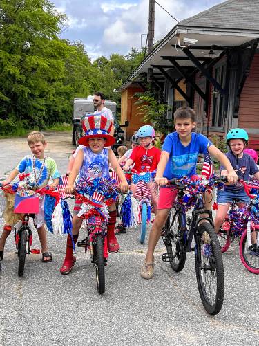 Greenville children are ready to ride down Main Street on July 4 for the children’s bike parade.