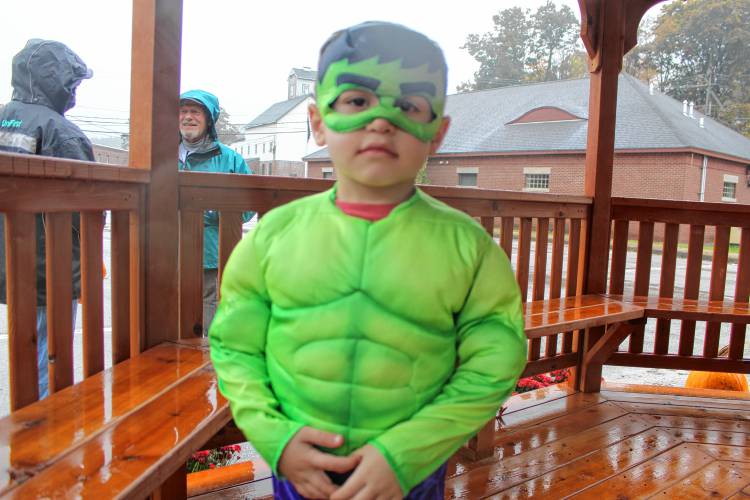 Lennon Francoeur, 4, of Greenville, dons a Hulk costume for trick-or-treat on Wilton Main Street.