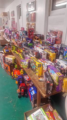 Toys and games sorted and ready for shopping at the Sunshine Fund toy storage space.