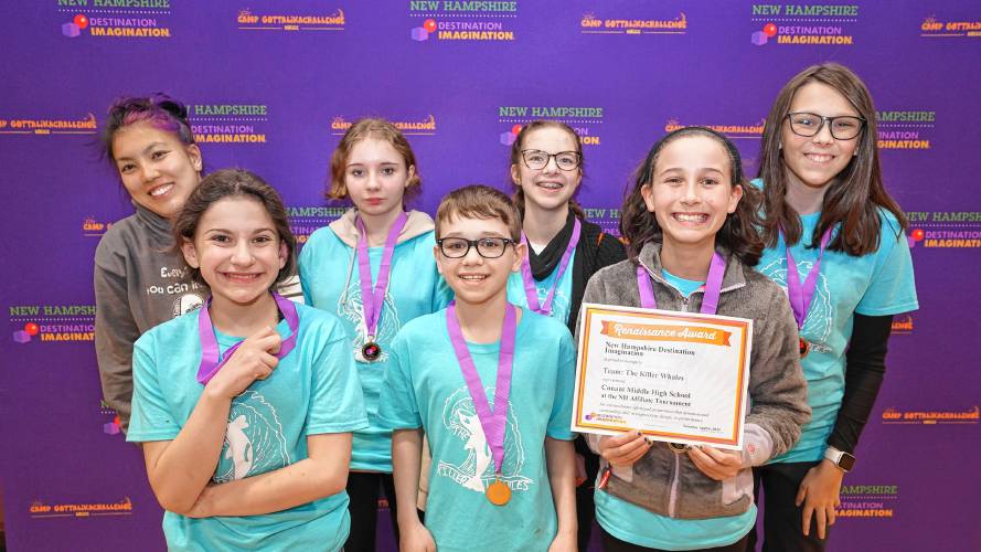 The Conant Middle High School Destination Imagination team, The Killer Whales, with their first place certificate.