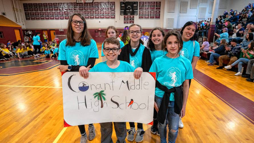 Conant Middle High School team The Killer Whales participates in the opening ceremony at the Destination Imagination state affiliate finals on Saturday.