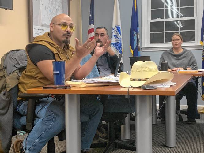 Jesus Cantu Trevino, Dan Heath and Selena Shaw discuss proposed cuts to the Mascenic budget during a meeting of the Advisory Budget Committee on Wednesday.