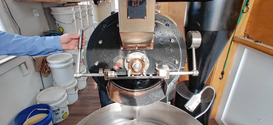 The coffee roaster at Parker and Sons can roast up to 25 pounds of coffee beans at a time.