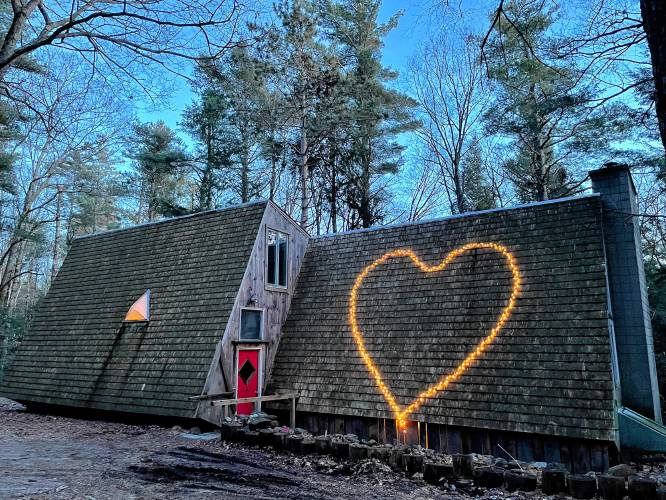 The Kalvaitis home is known in town for the heart-shaped lights facing the road. 