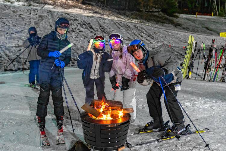 Skiers take part in Midnight Madness at Crotched Mountain.