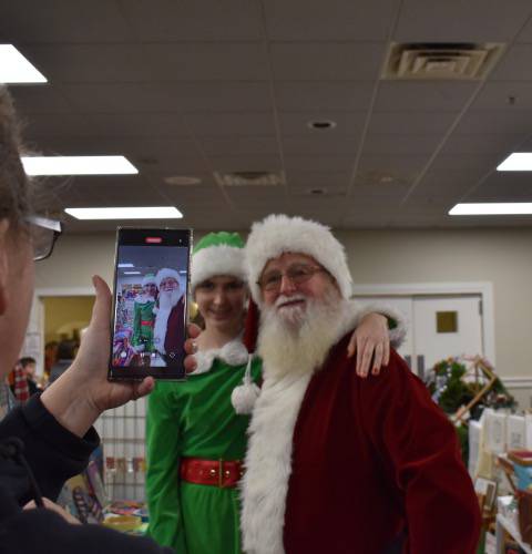 An attendee records a message from Santa.