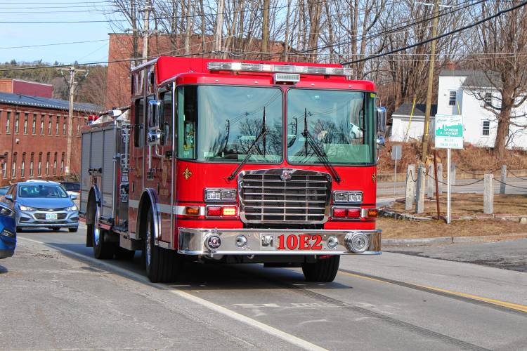 Greenville’s new Engine 2 drives down the street toward the fire station as it was being delivered.