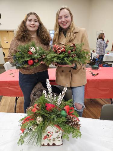 Olivia and Mattie Mitchell with their creations and Olivia's raffle win centerpiece in front.